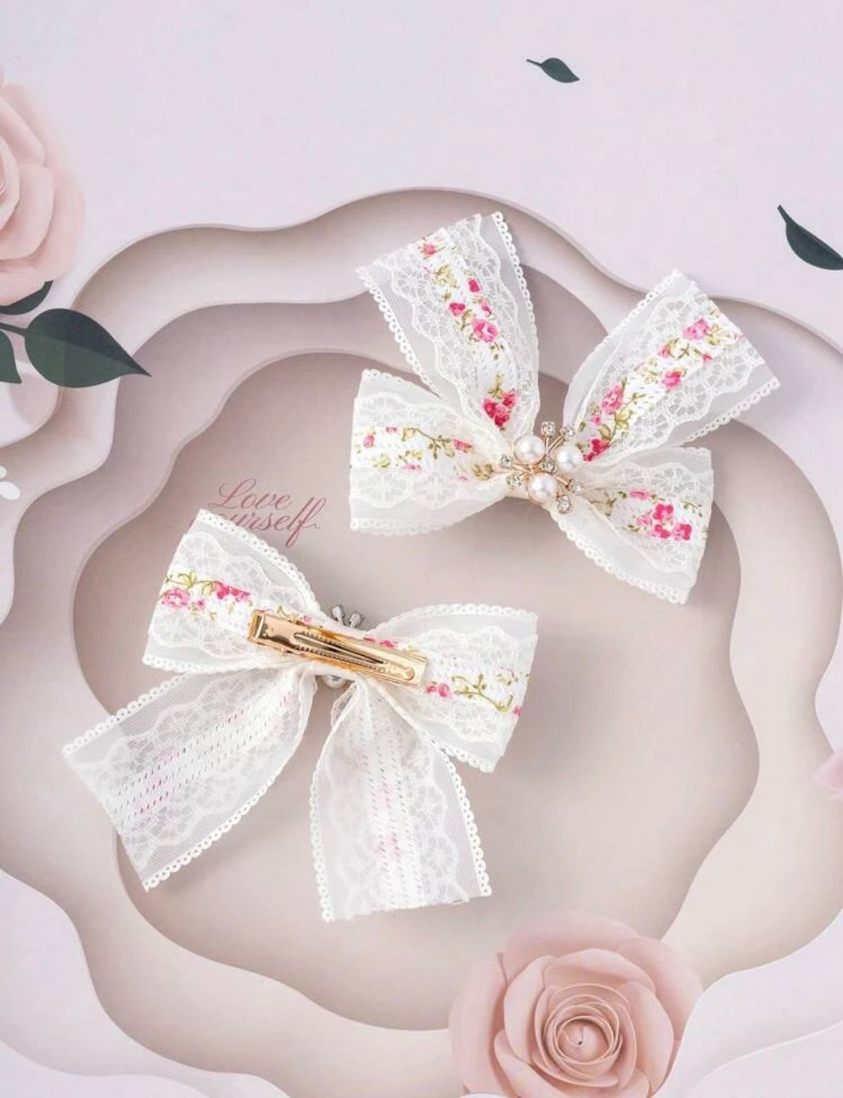 Pink and white floral bow hairclip
