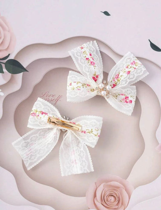 Pink and white floral bow hairclip
