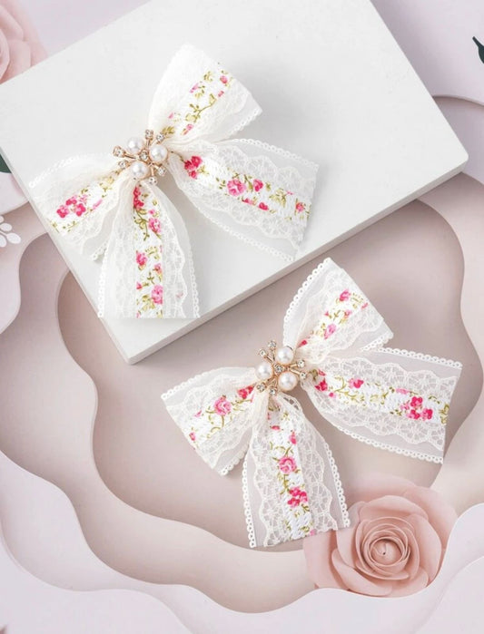 Pink and white floral bow hairclip